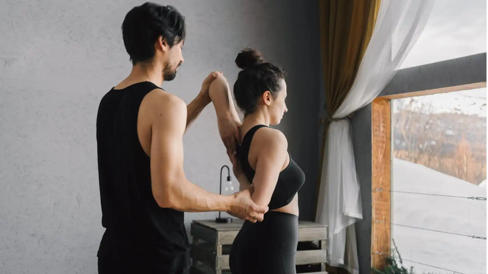  a guy and a girl doing body exercise